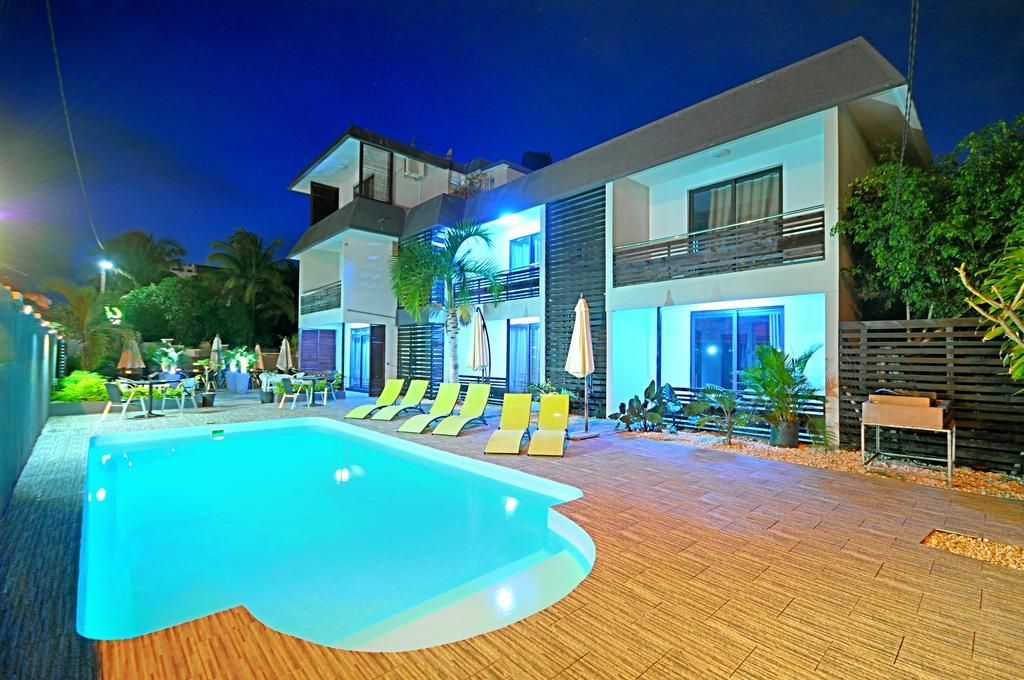 West Palm Inn Flic en Flac Bagian luar foto